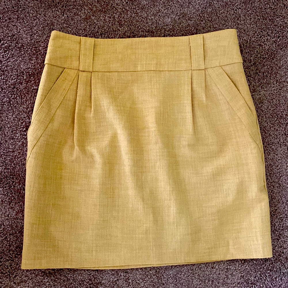 Forever 21 yellow gold mini skirt with pockets size small